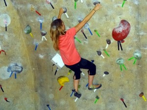 Road to Warrior - Carrie bouldering at the climbing gym